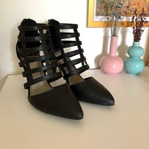 Fergalicious by Fergie Closed Toe Black Heels with Cutout Detail